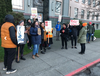 Protesters outside the Government Communications and Public Engagement office on Government Street on Friday, Feb. 14, 2020.