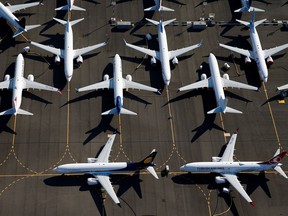Grounded Boeing 737 Mac aircraft are seen parked in an aerial photo at Boeing Field in Seattle.