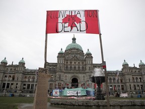 Wet'suwet'en protesters camp out in front of legislature before the speech from the throne in Victoria, B.C., on Tuesday, February 12, 2020.