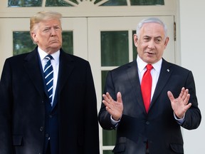 U.S. President Donald Trump and Israeli Prime Minister Benjamin Netanyahu speak to reporters at the White House on Jan. 27, 2020.