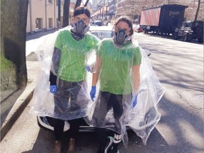 Two unidentified staffers from Vancouver company Cleaning with Love wear protective masks and plastic covers that block pathogens. Manager Jo Wang suggests householders should be cleaning their homes every day to stop the spread of COVID-19.