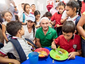 Actress Patricia Velasquez, founder of Wayuu Taya Foundation, and Frank Giustra meet with kids at World Central Kitchen and Nueva Illusion kitchen in Cucuta, Colombia. Photo credit: Paramo Films / Acceso