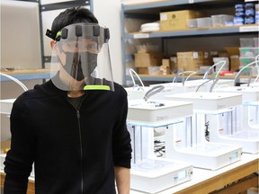 Tinkerine CEO Eugene Suyu with a face shield his company is now making to supply health-care workers.