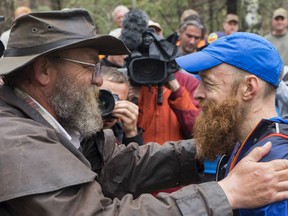 Race director Gary “Laz” Cantrell, left and runner Gary Robbins at the 60-hour Barkley Marathon in Wartburg, Tenn.