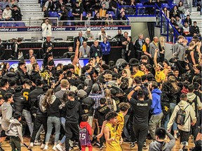 The Burnaby South Rebels defeated the Kelowna Owls 70-58 on Saturday to win the B.C. High School 4A Boys Basketball championship at the Langley Events Centre. Photo: Vancouver Sports Pictures