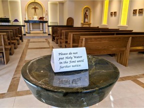 An empty holy water font at the John Paul II Pastoral Centre in Vancouver.