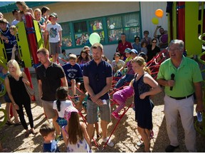 Johanna and Henrik Sedin (left) with Daniel and Marinette Sedin and Stan Watchorn, the principal of Kent Elementary. The Sedin families will match donations up to $35,000 to the Adopt-A-School Fund.