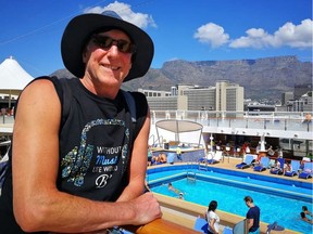 Vancouver resident Peter Driver on March 21 aboard the cruise ship Norwegian Spirit, with Cape Town's Table Mountain in the background.