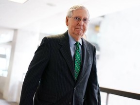 Senate Majority Leader Mitch McConnell, R-KY,  arrives for the Republican policy luncheon at the Hart Senate Office Building in Washington, D.C., on March 19, 2020.