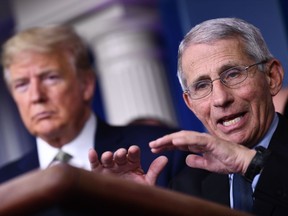 Dr. Anthony Fauci speaks as U.S. President Donald Trump listens during the daily press briefing on the coronavirus pandemic situation at the White House on March 17, 2020 in Washington, D.C.