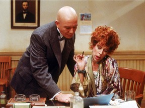 Carol Burnett as Miss Hannigan and Albert Finney as Daddy Warbucks in Annie.