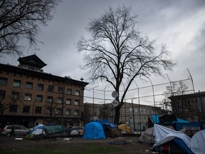 Tents are seen on a baseball diamond at a homeless camp at Oppenheimer Park in the Downtown Eastside of Vancouver, on Friday December 13, 2019. Homeless people staying in close quarters at shelters, tent cities and warming centres are especially at risk for COVID-19, says a community advocate who is working to ensure hand-washing stations and clean bathrooms are available in Vancouver.