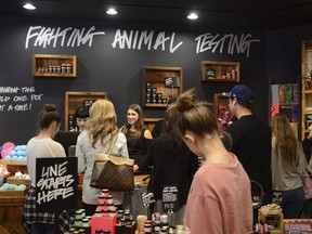 Holiday shoppers browse at Lush, a cosmetics store at Cherry Creek Shopping Center in Denver, Colo. on November 24, 2017. Cosmetics company LUSH has launched a campaign calling on people to pressure Parliament to back out of an agreement with the U.S. that governs refugee claims. It's part of a broader effort by the U.K.-based company to draw attention to the impacts of major changes to U.S. immigration policy.