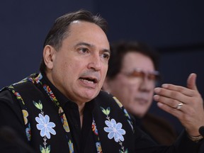 Assembly of First Nations (AFN) National Chief Perry Bellegarde is joined by First Nations leaders as they discuss the current situation and actions relating to the Wet'suwet'en hereditary chiefs during a press conference at the National Press Theatre in Ottawa on Tuesday, Feb. 18, 2020.