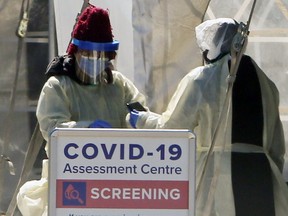 A COVID-19 Assessment Centre is set up outside of Birchmount Hospital on Saturday, March 21, 2020. (Veronica Henri/Postmedia Network)