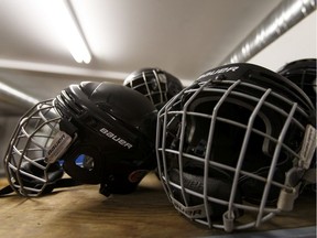 Donated helmets are seen at Sport Central in Edmonton, Alta., on Thursday March 17, 2016.