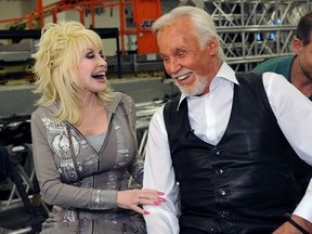 Singers/Songwriters Dolly Parton and Honoree Kenny Rogers Backstage at the Kenny Rogers: The First 50 Years show at the MGM Grand at Foxwoods on April 10, 2010 in Ledyard Center, Connecticut. (Rick Diamond/Getty Images)