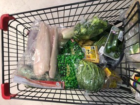 A customer's cart filled with the supplies they're purchasing in response to news about coronavirus disease (COVID-19) at T&T Supermarket on Southwest Marine Drive in Vancouver, British Columbia, Canada March 14, 2020.