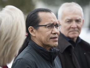 Wet'suwet'en hereditary leader Chief Woos, Minister of Crown-Indigenous Relation, Carolyn Bennett and B.C. Indigenous Relations Minister Scott Fraser address the media in Smithers, B.C., Sunday, March 1, 2020.