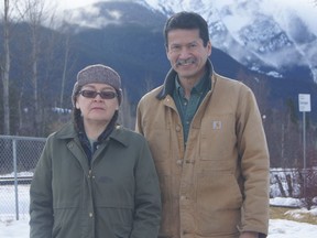 Cynthia Joseph, band chief of Hagwilget First Nation (Wet'suwet'en), and Norman Stephens, hereditary Chief Spookwx (Gitxsan), stand outside the CN Rail line in New Hazelton, B.C. on Feb. 24, 2020.