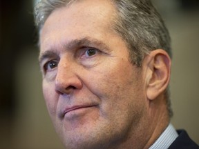 Manitoba Premier Brian Pallister speaks to reporters in Ottawa, on Friday, Nov. 8, 2019.