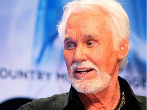 Kenny Rogers, backstage after accepting the Willie Nelson Lifetime Achievement award at the 47th Country Music Association Awards in Nashville, Tennessee November 6, 2013.