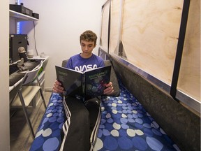 Oliver Crook, 13, in his tiny 32 square-foot bedroom at his dad's Yaletown condo.