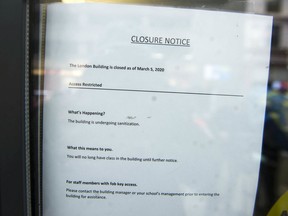 A sign announcing the temporary closure of University Canada West in Vancouver, after a student was quarantined  over fear of a Covid-19 infection.