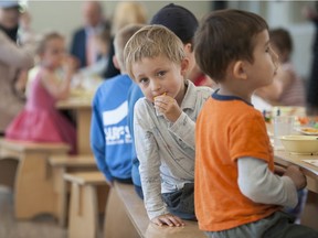 Children at the Novaco Daycare in North Vancouver wait to meet Premier John Horgan last year. Horgan's government has introduced a package of financial supports aimed at keeping the child care system operational.