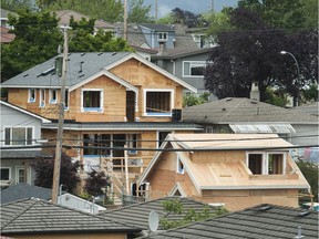 Construction of a new home and a laneway home in East Vancouver.