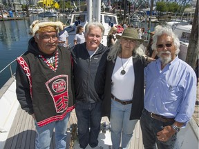 Biologist Dr. Alexandra Morton (second from right) joined Dr. David Suzuki (right), Martin Sheen (second from left) and Dzawadaenuxn First Nation traditional leader Willie Moon (left) aboard the RV Martin Sheen in 2017.