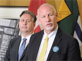 Chief planner Gil Kelley, right, with Mayor Kennedy Stewart, appears at a media availability March 11 at Vancouver City Hall concerning the initial findings from the citywide engagement process to develop a Vancouver Plan.