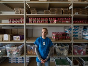 Emily Anne King inside Backpack buddies warehouse in North Vancouver. King is pleading for hoarders to stop as it is impacting the supply chain that helps her charity feed 1300 hungry kids across the province each week.