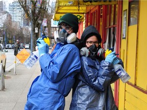 Amy Gronbeck-Jones (left) and Helena Smazynski work for CleanStart disinfecting and sanitizing SROs in the Downtown Eastside.