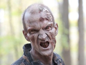 Michael Munday played a zombie in The Walking Dead. (AMC)