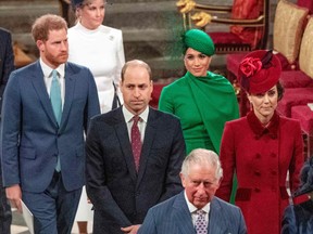 Britain's Prince Harry, Duke of Sussex (L) and Britain's Meghan, Duchess of Sussex (2nd R) follow Britain's Prince William, Duke of Cambridge (C) and Britain's Catherine, Duchess of Cambridge (R) as they depart Westminster Abbey after attending the annual Commonwealth Service in London on March 9, 2020.