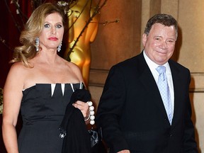 In this Feb. 24, 2013, William Shatner (R) and then-wife Elizabeth Shatner depart the Oscars at Hollywood & Highland Center on in Hollywood, Calif.