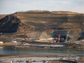 View of the tunnel inlet portal with the inlet bypass road and diversion structures under construction in 2019.