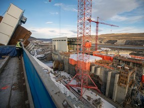 Penstock units being installed at B.C. Hydro Site C dam project. Work is being scaled back on the huge site because of COVID-19.