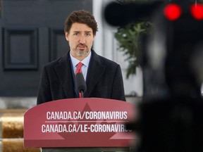 Prime Minister Justin Trudeau outlines the new small business aid package in his Friday update outside his home in Ottawa.