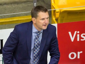 Coach Mike Vandekamp behind the bench of the Cowichan Valley Capitals.