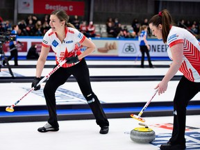 In this March 16, 2019, file photo, Canada's players in action in their World Women's Curling Championship first round match against Korea in Silkeborg, Denmark.
