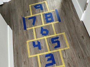 Indoor hopscotch for kids while stuck at home during the coronavirus pandemic. Photo: Megan Pratt-Konowalchuk