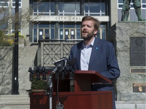 Jonathan Cote, mayor of New Westminster and Mayors' Council chair, speaks to reporters in front of New West city hall about the challenges TransLink is facing with the huge decrease in ridership during the COVID-19 pandemic.
