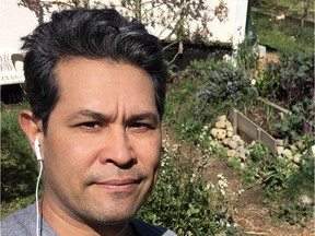 Sunshine Coast Tourism executive director Paul Kamon working from home in his Powell River garden.