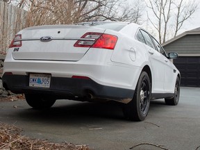 A Ford Police Interceptor sedan with no markings, is parked at the Atlantic Denture Clinic in Dartmouth, N.S. on Monday, April 20, 2020.