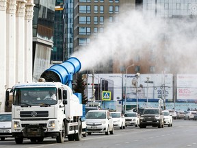 A truck sprays disinfectant as a preventive measure against coronavirus at Sukhbaatar square in Ulaanbaatar, the capital of Mongolia.