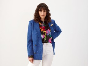 A model wears the Hubert blazer in blue wool an the Gia blouse from Canadian brand Ellie Mae Studios.