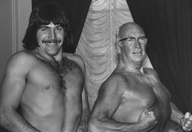 Vancouver Canucks draft choice Dennis Ververgaert poses shirtless with the team's tough guy owner Coley Hall, May 29, 1973. Ralph Bower/Vancouver Sun