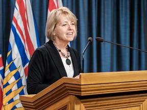 In a joint statement, Health Minister Adrian Dix and provincial health officer Dr. Bonnie Henry, pictured, said the province is seeing the benefit of increased social distancing restrictions and mask mandates that were put in place on Nov. 20, when the province recorded a single-day case count of 927, according to the B.C. Centre of Disease Control.
